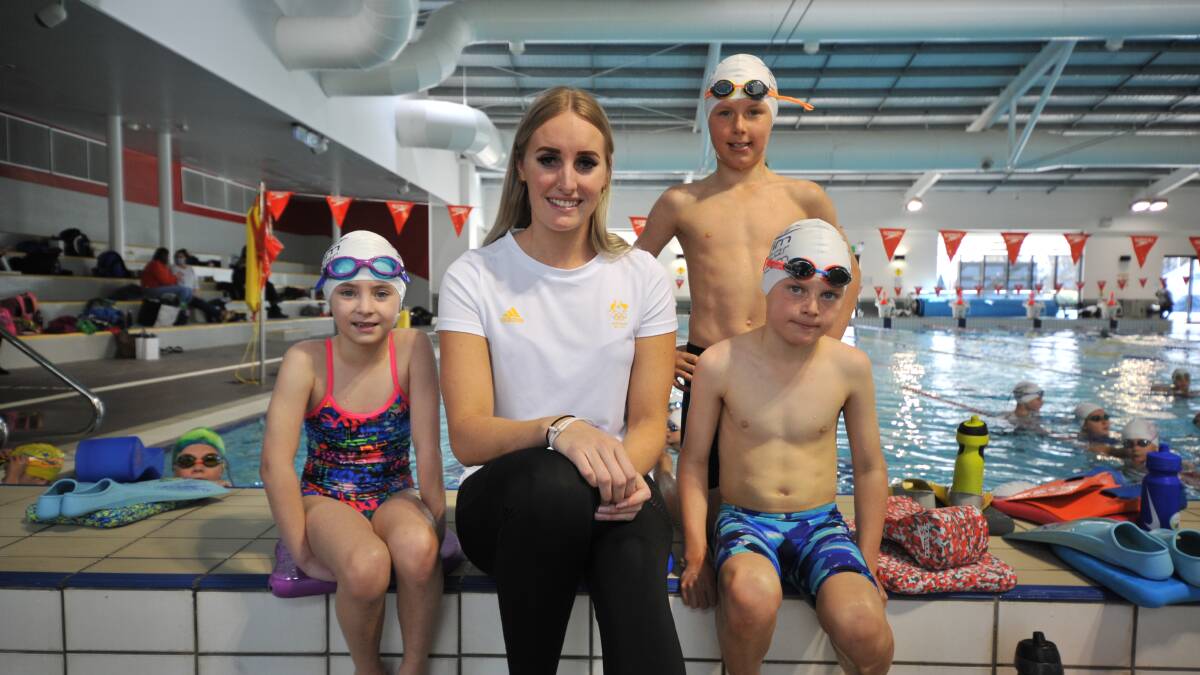 GOLD STANDARD: Emma Howell, Taylor McKeown, Jock Bowman and Henry Kay at the Orange Aquatic Centre. Photo: CARLA FREEDMAN.