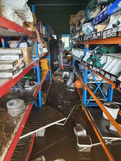 Damage to Agwise Rural Supplies and Steel on the morning of the flood.
