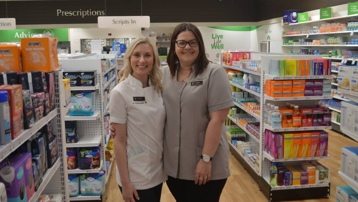 NEW LOOK: Lauren Butler and Caitlin Haase from Life Pharmacy are loving the new location inside the Summer Centre. Photo: RILEY KRAUSE.