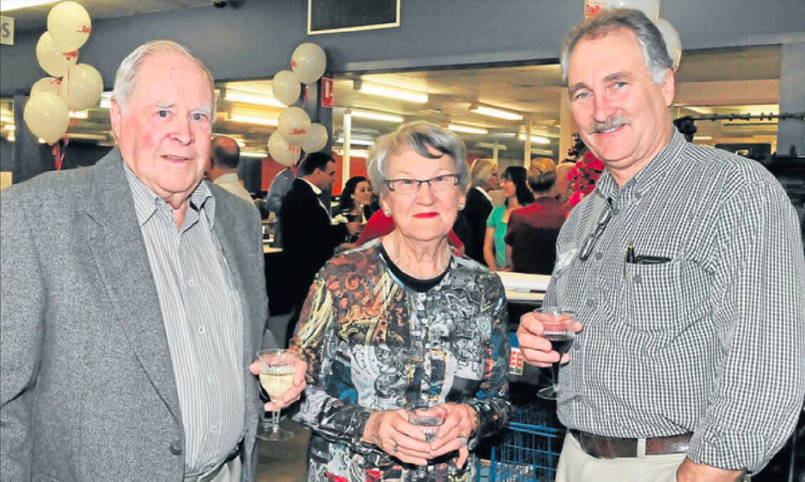 Ewen and Alma Cameron chat with Paul Cox at the Central Western Daily offices in 2011to celebrate 150 years of newspapers in Orange. Picture by 