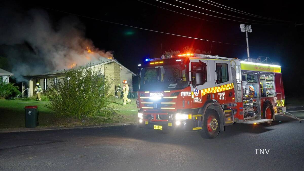 DESTROYED: A house in Pindari Place caught fire in the early morning of Thursday as emergency services battled for hours to put it out. Photo: TNV/TROY PEARSON.