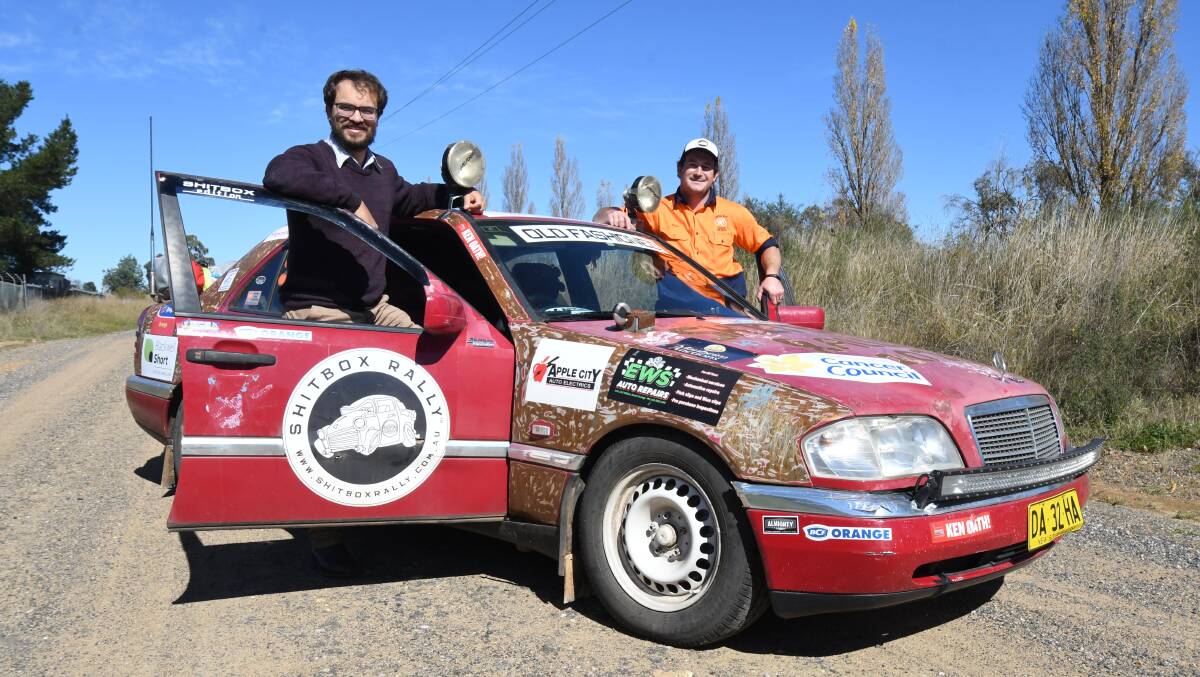 TOUGH TIMES AHEAD: Henri Sutton and Sean Ryan will be taking 'Micky the Merc' on a drive more than 3500km long. Photo: CARLA FREEDMAN.