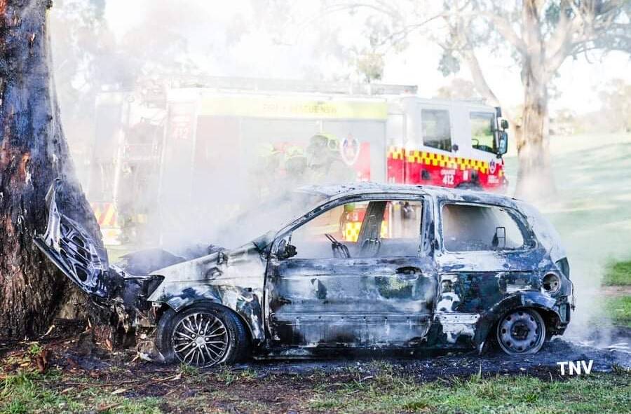 DESTROYED: The car that was torched in Glenroi. PHOTO: TNV/TROY PEARSON 
