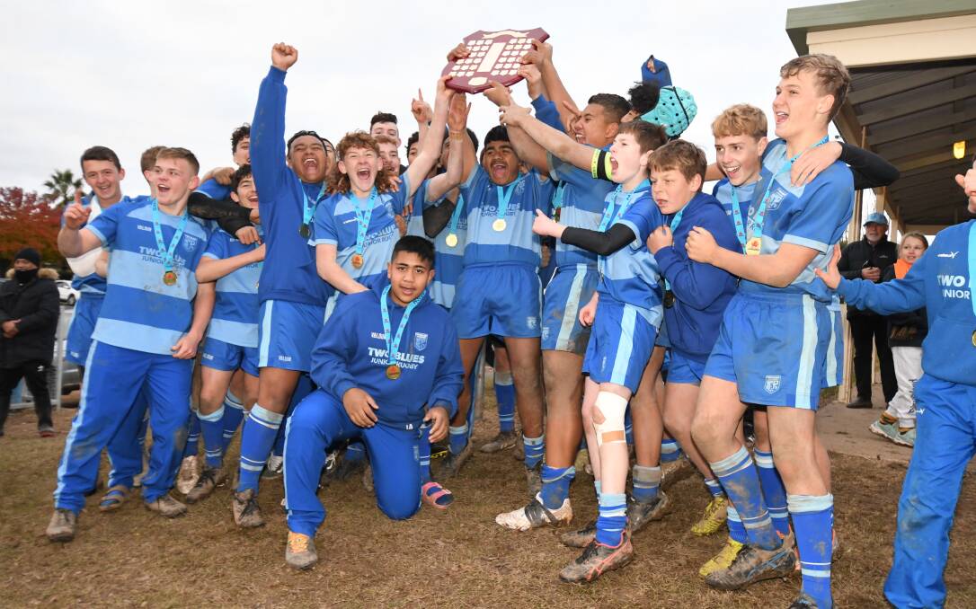 DELIGHT: The Two Blues lifted the winner's shield following a 15-12 victory over Eastwood. Photo: JUDE KEOGH.