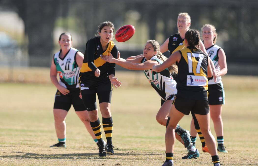 STRONG START: Aspasia "Spice" Manos and the Orange Tigers had the measure of the Lady Bushrangers thanks to a dominant first quarter in Saturday's AFL Central West women's game in Cowra. Photo: PHIL BLATCH
