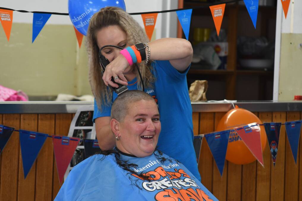 ALL GONE: Kylie Shelker got her head shaved by Rachael Zegzula for the World's Greatest Shave after she raised nearly $2,000. Photo: JUDE KEOGH.