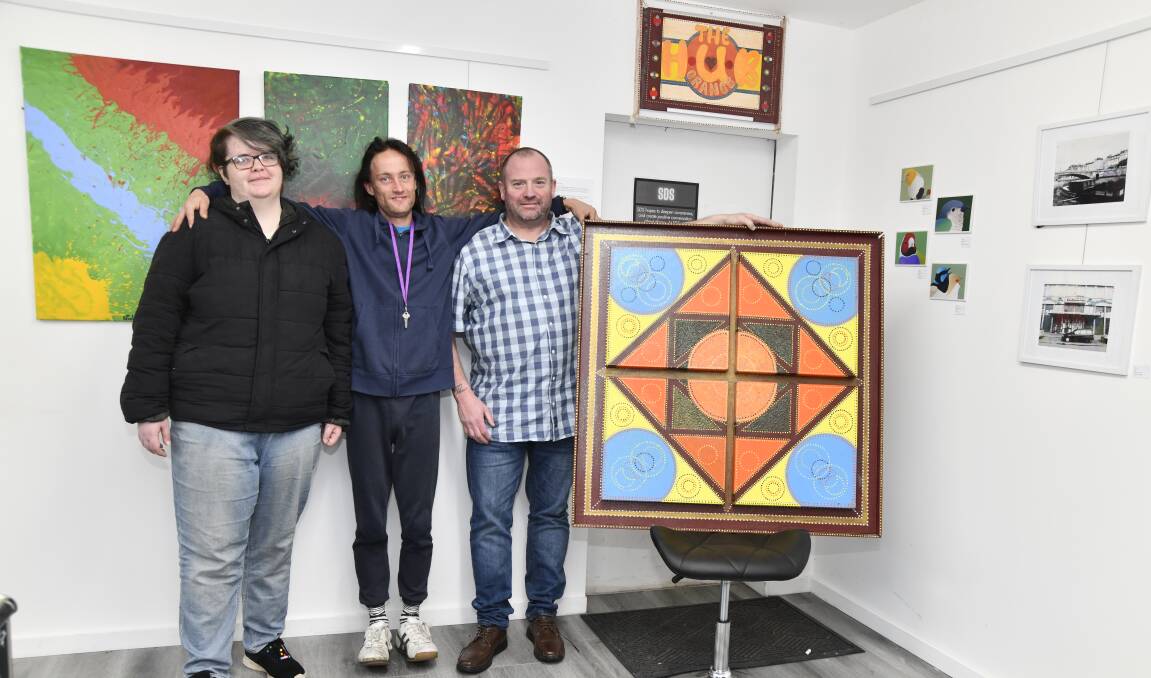 Hunter McLachlan, Nicholas Bermingham and Alan Maurice with their works of art. Picture by Jude Keogh.
