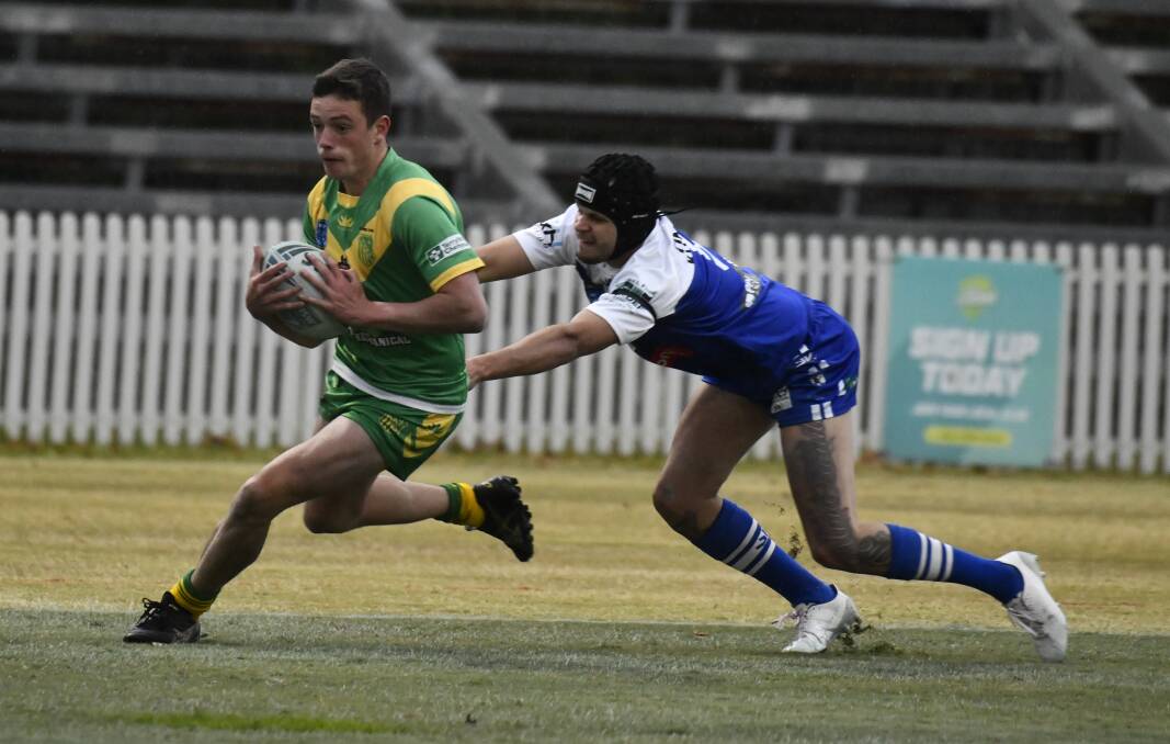 St Pat's winger Callan Nadan attempts to tackle CYMS' Oli Maunder. Picture by Carla Freedman