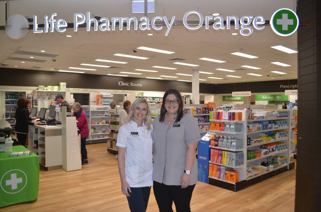 NEW LOOK: Lauren Butler and Caitlin Haase from Life Pharmacy are loving the new location inside the Summer Centre. Photo: RILEY KRAUSE.