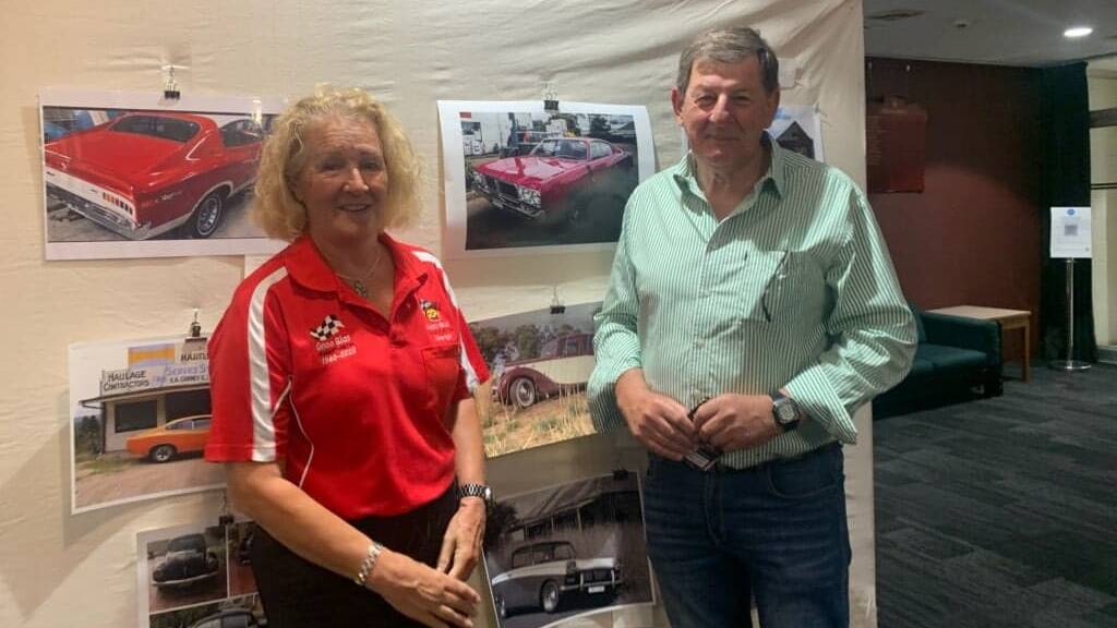 OPENING DAY: Mayor Reg Kidd with Gnoo Blas Car Club member Debbie Robinson at the art show in the Orange Civic Centre.