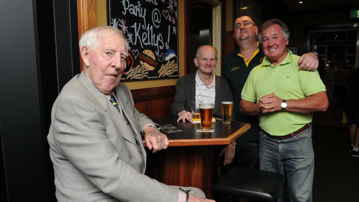 HE WILL BE REMEMBERED: Tony Kelly, Tom Commins, John Covelli and Peter Snowden enjoying a drink back in 2014. Photo: STEVE GOSCH