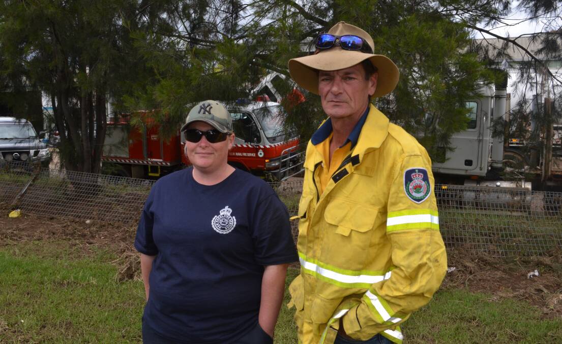 Carlie Smith and Daryl Wright from the Rural Fire Brigade at the site of a home in Cudal. Picture by Riley Krause.