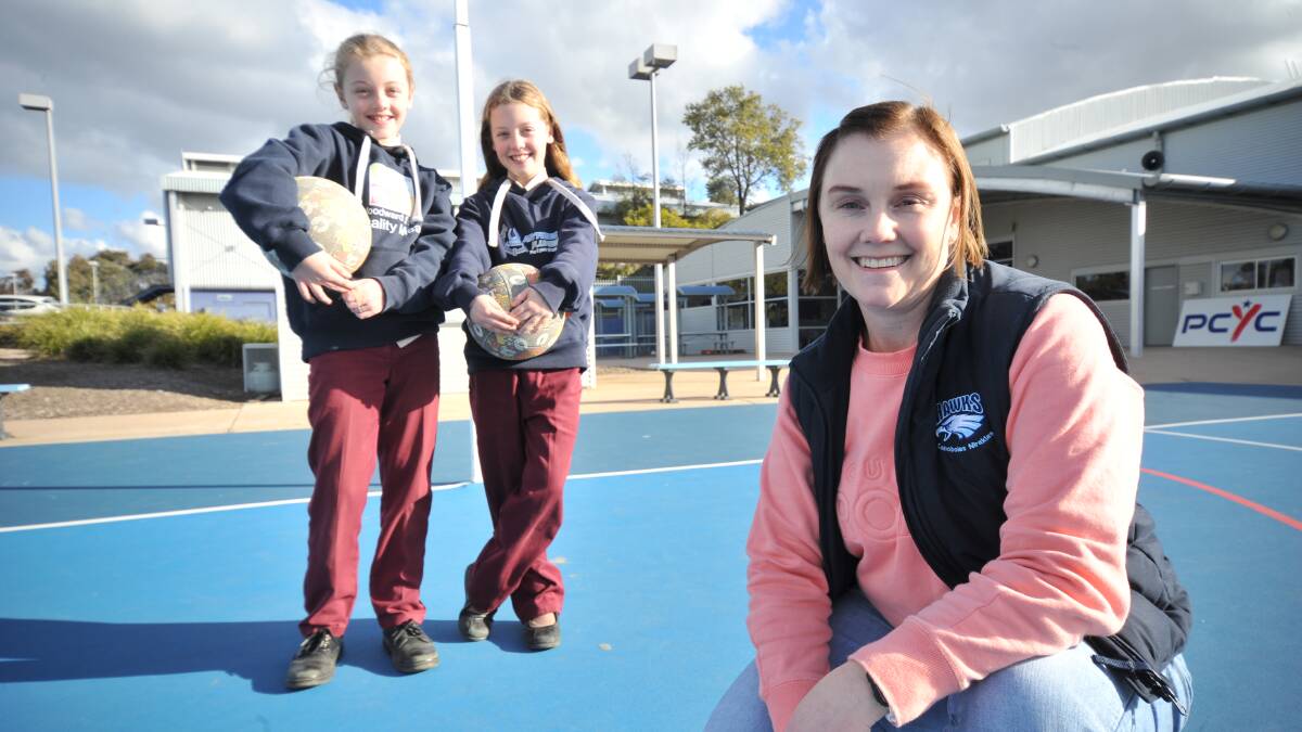 GROWING THE GAME: Matilda, Emily and Michelle George would love to see netball added to the schedule for the 2032 Olympic Games set to be hosted in Brisbane. Photo: JUDE KEOGH. 