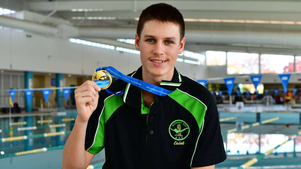 NATION'S BEST: Caleb Cashman holds his gold medal from the Australian Age Swimming Championships. Photo: ALEXANDER GRANT