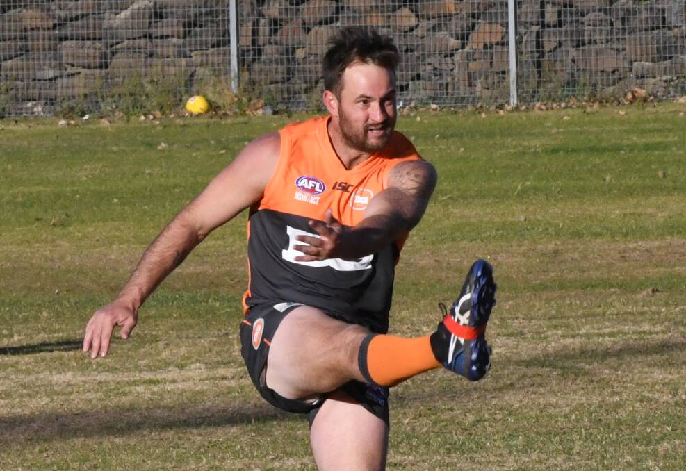 KICKING ON: Paul Jenkins kicked four goals for the Bathurst Giants in their second win of the Central West AFL season over the Bathurst Bushrangers Outlaws. Photo: CHRIS SEABROOK
