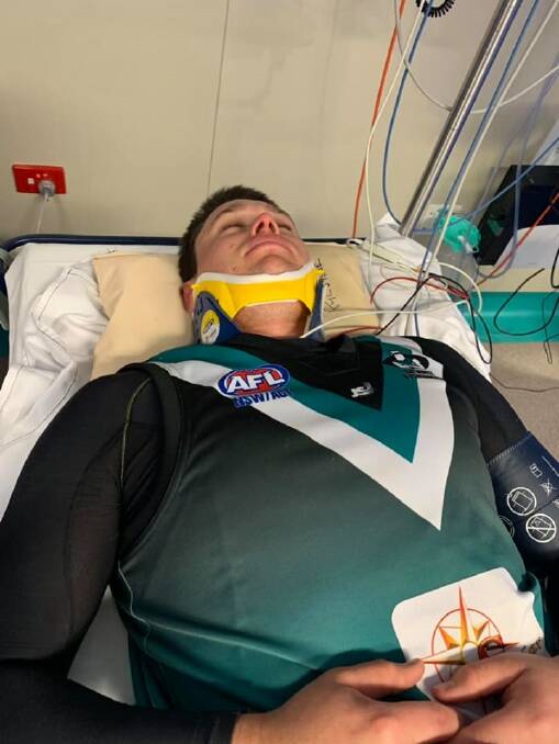 SCARE: Dam Ryan goes through the process after being taken from the field on Saturday with a suspected spinal injury, fortunately he's been cleared of anything serious.