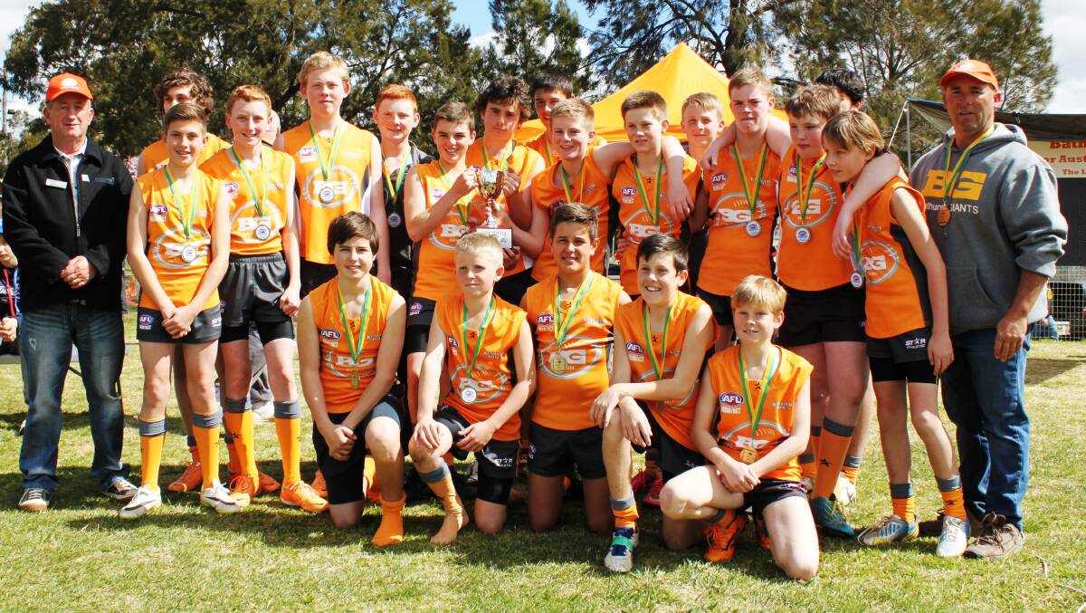 Shane Broes with his 2014 Bathurst Giants under 15s team.