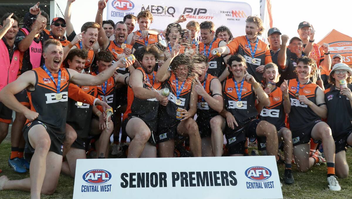 The Bathurst Giants celebrate after taking out Saturday's AFL Central West senior men's tier one grand final. Picture by Phil Blatch.