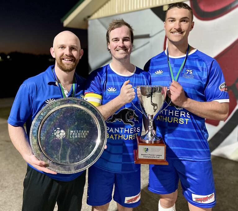 Andrew Smith, James Christie and Callum Weafer with the minor premier's plate and the champion's trophy. Picture by Murray McCloskey.