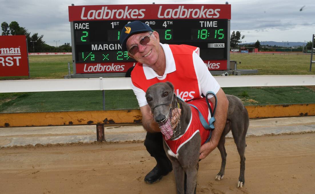 UPSET SUCCESS: Handler Tony Messina with winning runner Blue Boy Mae. It was a quinella for trainer Penny Williams who had Paris Gold take the runner-up spot. Photo: CHRIS SEABROOK