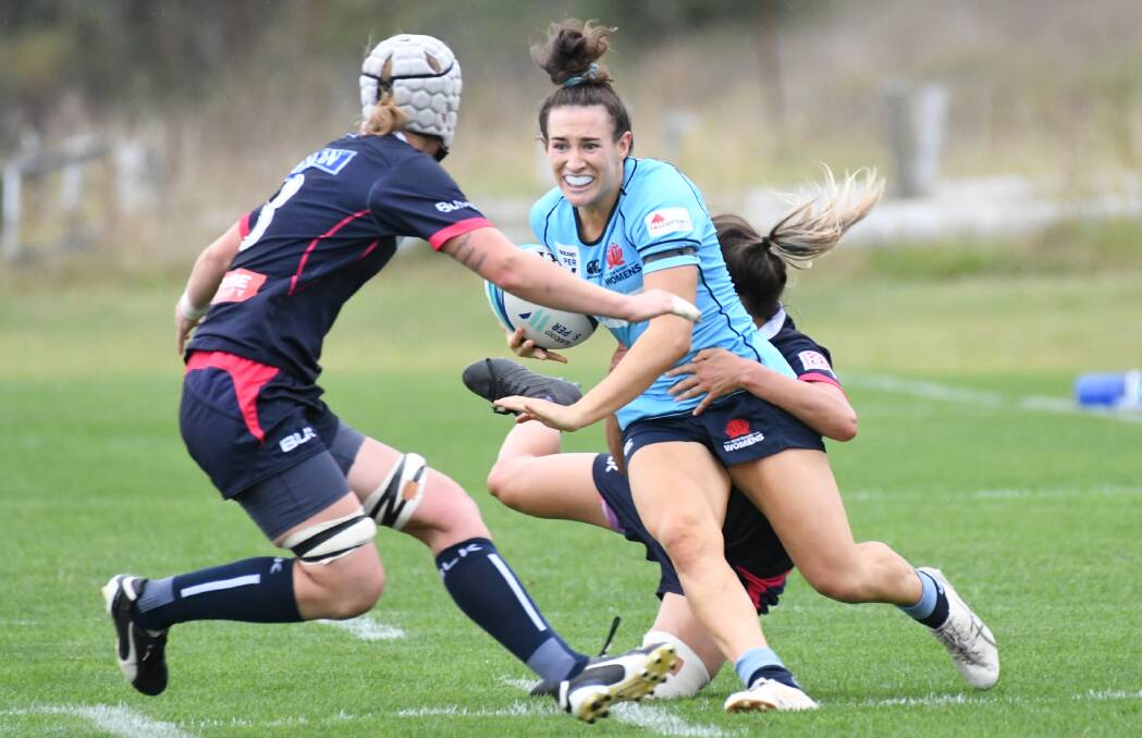 All the action from the NSW Waratahs' win over the Melbourne Rebels on Sunday, at Bathurst's Anne Ashwood Park. Photos by CHRIS SEABROOK