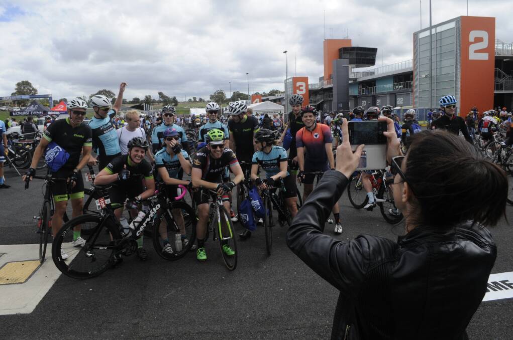SMILE: Riders pose for a photo following the 2017 Blayney to Bathurst, the first edition to act as a UCI World Gran Fondo Championships qualifier. Photo: CHRIS SEABROOK