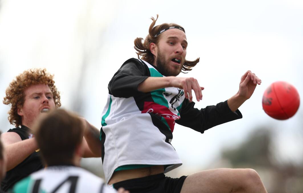BOUNCING BACK: Sebastian Matheson and the Bathurst Bushrangers Rebels recovered from a poor start to put away Parkes Panthers. Photo: PHIL BLATCH