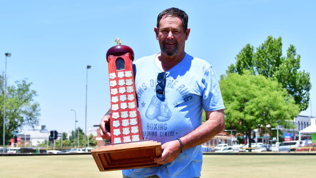 THE GRAND PRIZE: Bathurst City Bowling Club secretary John Archer with the prestigious Carillon City Fours trophy. Photo: ALEXANDER GRANT