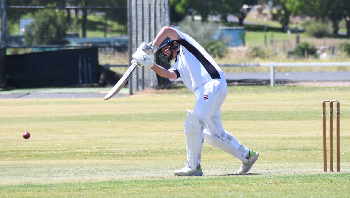 DOWN THE GROUND: Orange's Murray Fisher crunches one down the ground in his side's final-round loss to Macquarie on Sunday. Photo: AMY MCINTYRE