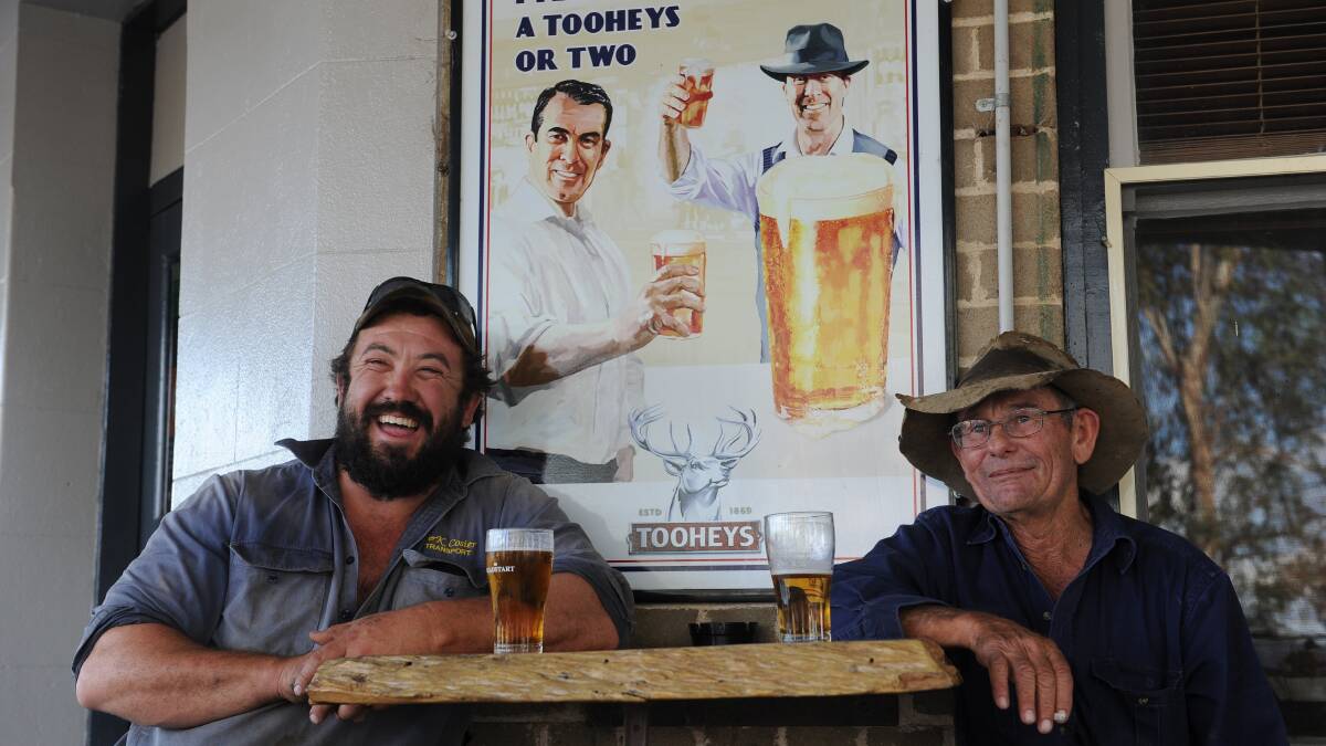 Two locals savour the flavour at Armatree Hotel. The pub keeps the community together.