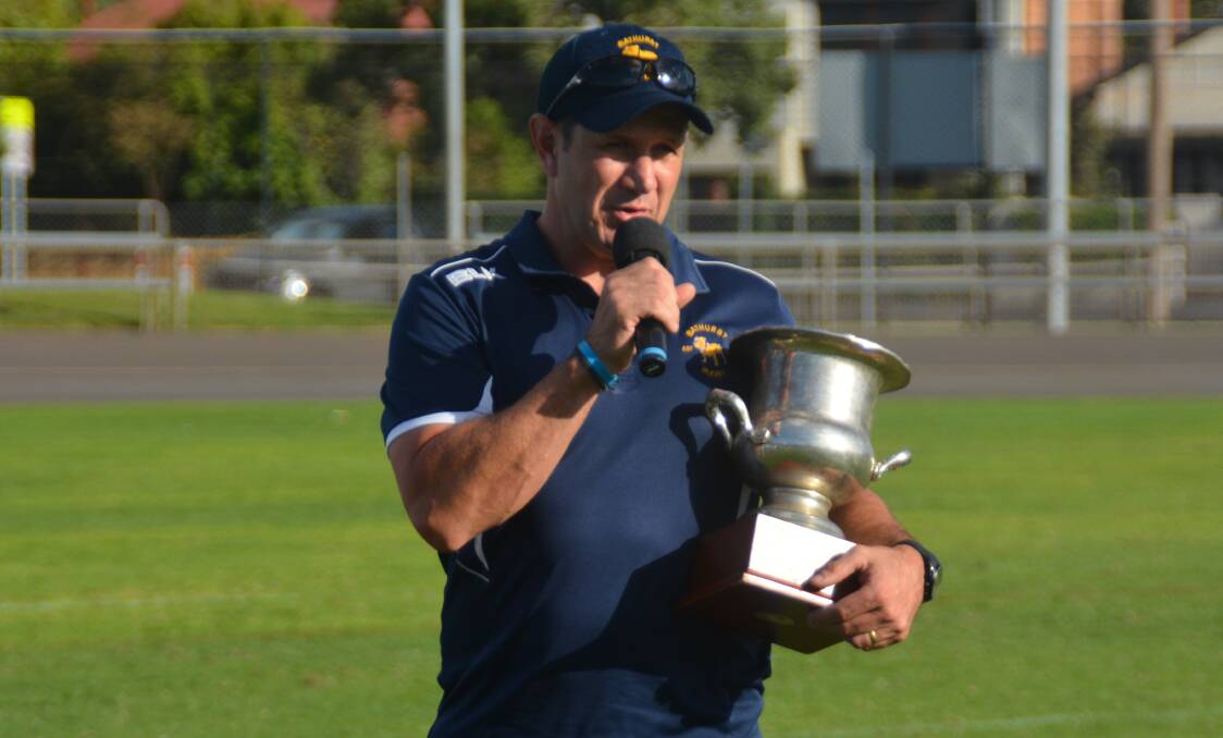SPECIAL: Bathurst Bulldogs president Greg Reid with the Ken Laird Cup after his side downed the Dubbo Kangaroos on Saturday. Photo: NICK GUTHRIE