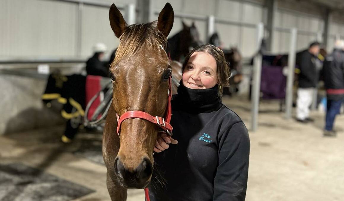 Kim Grant with pacer Bill Shannon after their victory at Bathurst Harness Racing Club on Wednesday, July 5. Picture by Charlie Gilfillan 