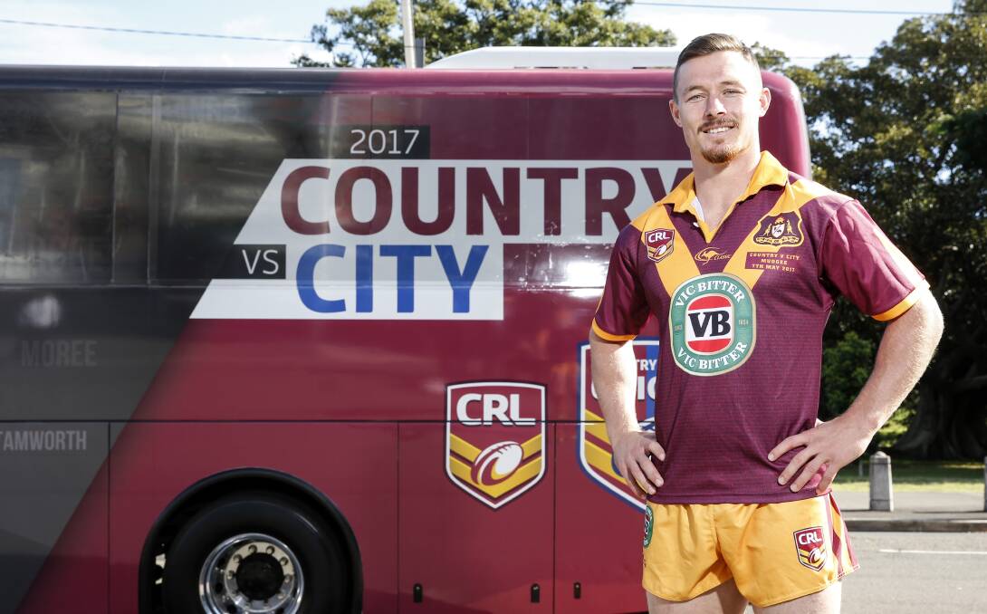 PRIDE: Damien Cook shows off the new Country jersey, one which honours all the former players. Photo: NRL