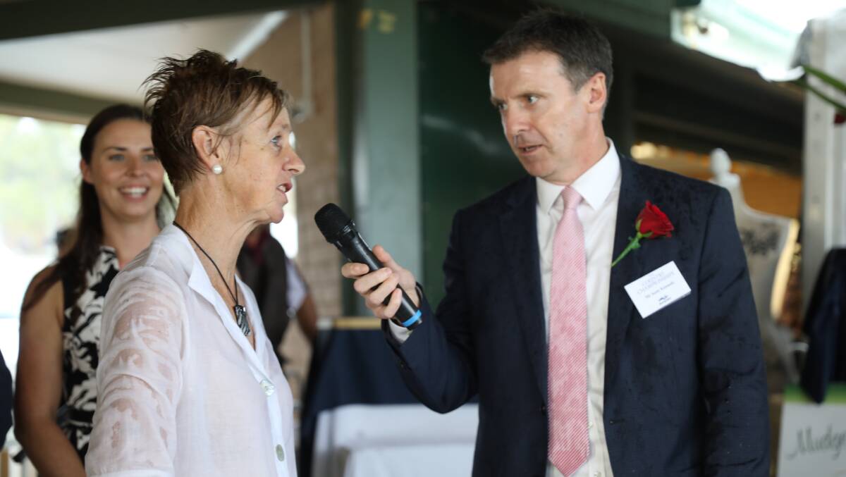 IN THE FINAL: A soaked Gayna Williams speaks with Scott Kennedy from Racing NSW after the Mudgee qualifier. Photo: NICK McGRATH