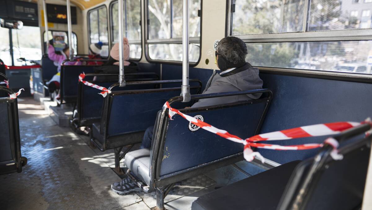 Social distancing on a Thredbo shuttle bus at the Thredbo Alpine Resort. Picture: Dion Georgopoulos