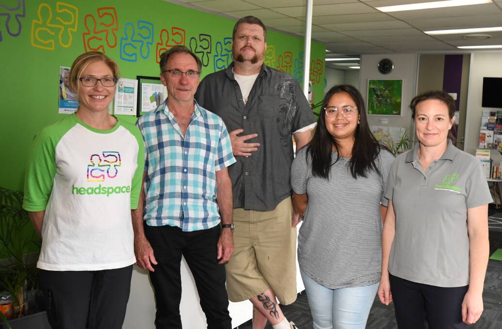 SUPPORT SERVICE: Gail Carson from headspace with Micheal Pitt from Interrelate, Neville Atkinson, Monica Saigi and Colette McCormack from headspace. Photo: JUDE KEOGH