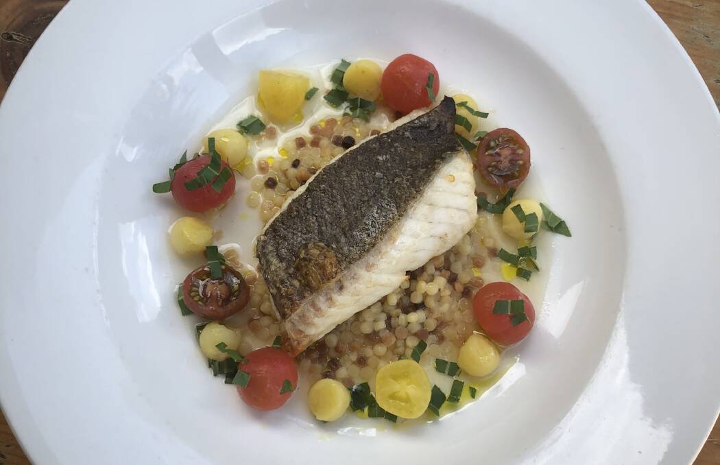 FISH DISH: Chef Richard Learmonth's baked fillet of Murray cod with fregola, jacklyn potatoes, tarragon and cherry tomatoes is a Sister's Rock favourite. Photo: supplied