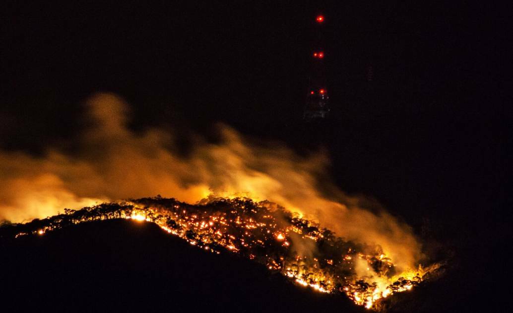 ABLAZE: The fire tore through bushland around Mount Canobolas on Saturday February 10. Photo: TROY BARRETT