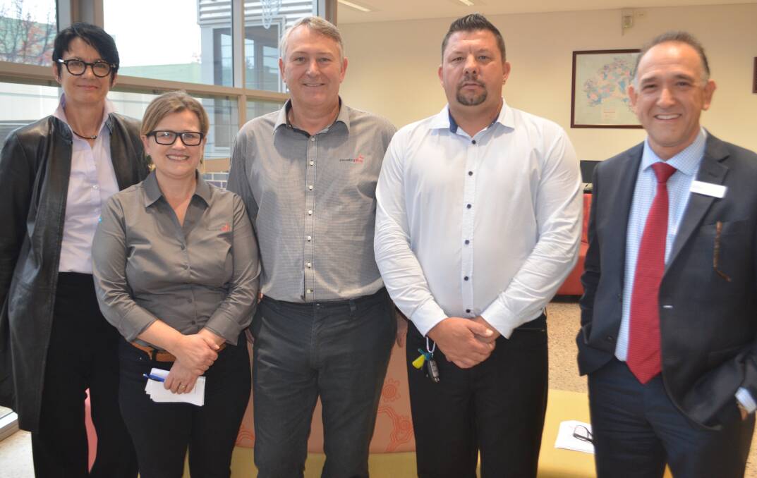 PATHWAYS PARTNERS: Jo Lawrence, Penny Dordoy, David Fisher, Adam Gollan and Craig Randazzo will work together to implement Opportunity Pathways. Photo: ALEX CROWE