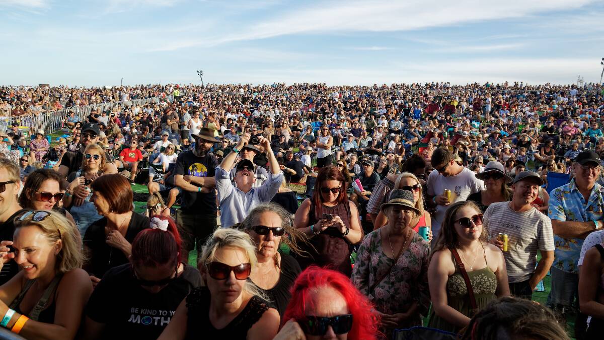 Crowds pack the lawns at A Day on the Green in Newcastle. Photo: Paul Dear.