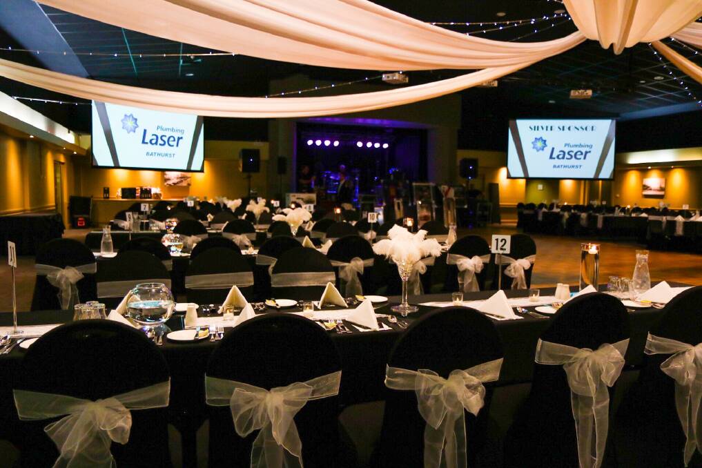 BALL GLAMOUR: The Housing Plus team will transform the Orange Ex-Services' Club Coral Sea Room into a White Tie Ball worthy function room.