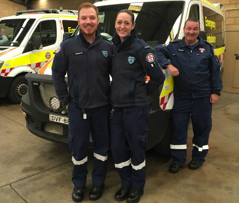FRESH FACES: Cameron Clout and Colette Finch are undergoing their 12-month training program at Orange ambulance station under the watchful eye of senior paramedics, including Matthew Pickering. Photo: ALEX CROWE