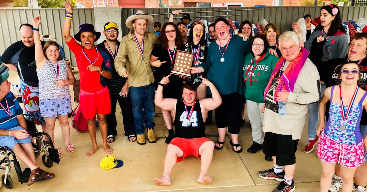 FIRST PLACE: LiveBetter's champion swimming team put in a stellar effort this week and bought the trophy home after a few too many years in Parkes. Photo: supplied.