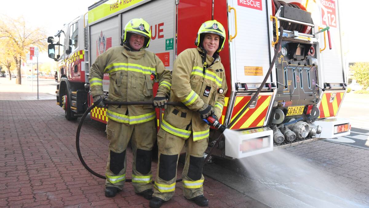 ON FIRE: Fire and Rescue NSW Senior Firefighters Dan Meecham and Mitch Crump ahead of Saturday's open day. Photo: CARLA FREEDMAN