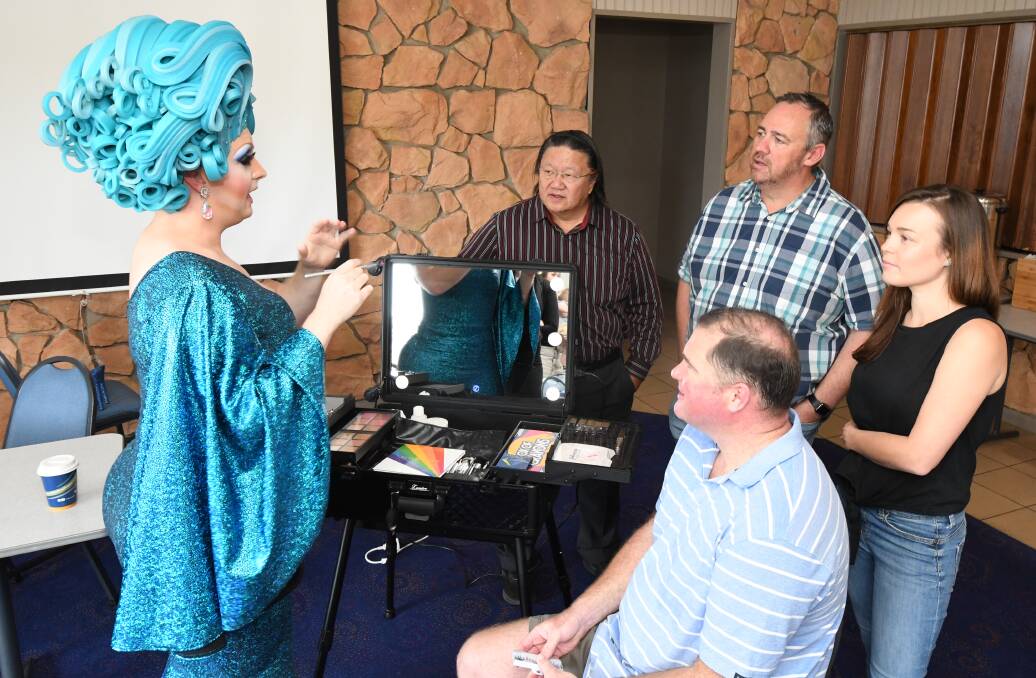 FUN RAISER: Betty Confetti gives David Howe, Scott Preston, Matt Jeffery and Ashlee Maguire a makeup lesson. Photo: ALEX CROWE 0116jkdrag4