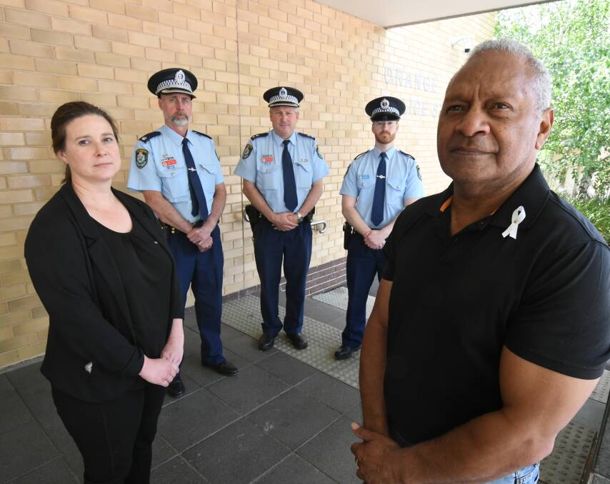 UNITED FRONT: Rochelle Monaghan, 
Chief Inspector Dave Harvey, Chief
Inspector Peter Atkins, Snr Constable
Greg Foster and White Ribbon
ambassador Gerald Power. 
Photo: JUDE KEOGH 