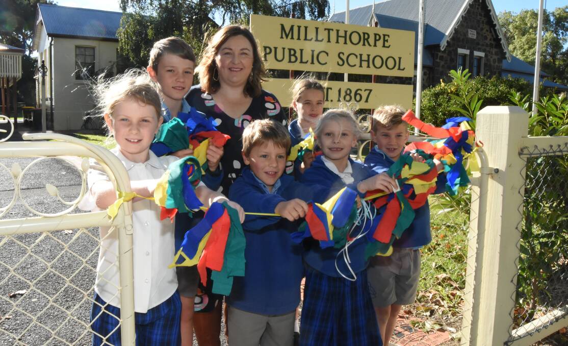 MARKET READY: Millthorpe Public School teacher Penny Granger with students Eden Czyzewski, Toby Harrison, Tully Howarth and Reggie Jamieson at the front and Henry Booth and Imogen Anagnostaras-Adams at the back. 