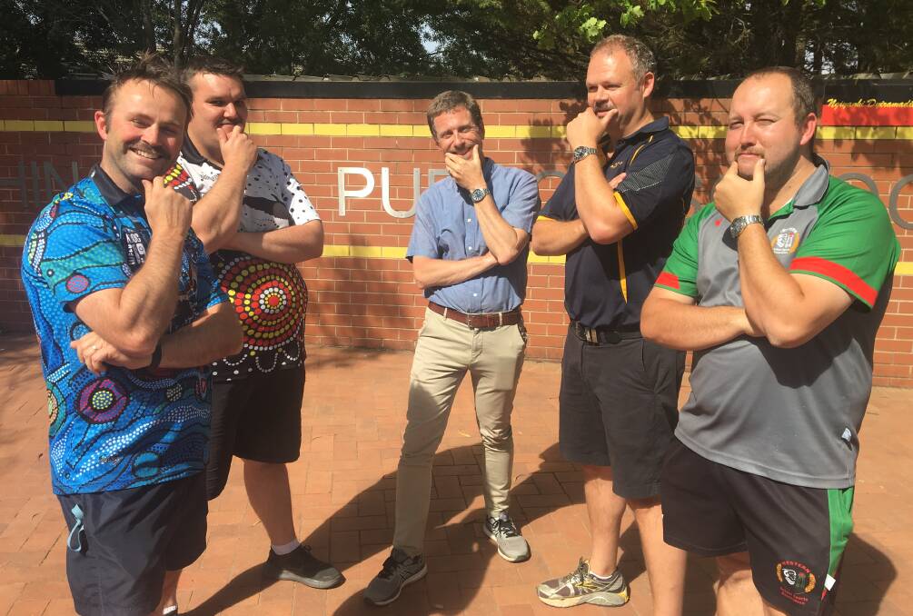 MO BROS: Bletchington Public School Michael Kelly and David Bailey with Orange Public School's Andrew McDonald, Mike Sillett and Drew Bale ahead of the end of month shave. Photo: ALEX CROWE