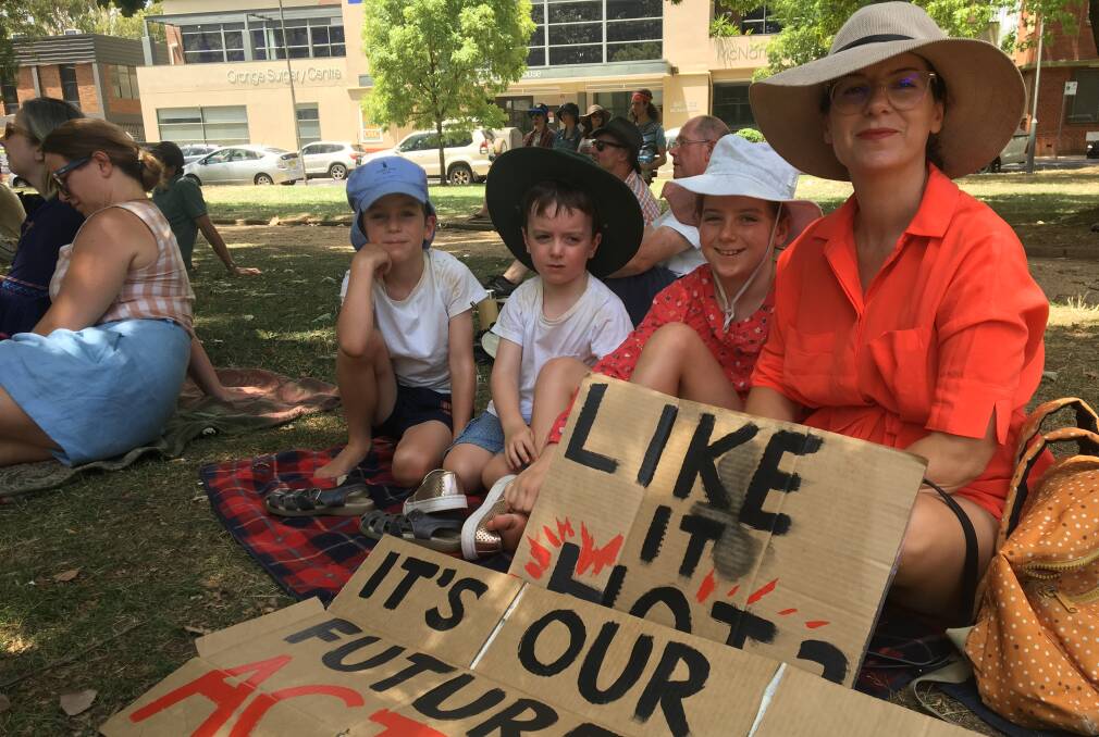 EXTINCTION REBELLION: Sam, Francis, Matilda and Kate Curtain at the climate change protest in Robertson Park. Photo: ALEX CROWE