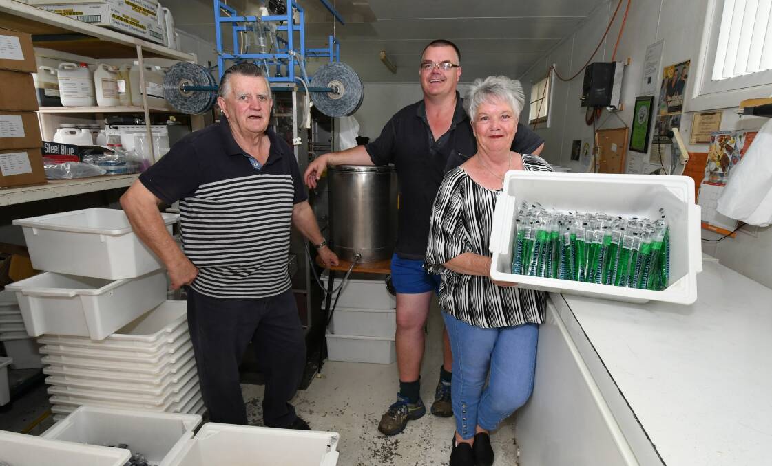 WATER ONLY: Dick, Glen and Marie Middleton had to stop making milk ice blocks at their Hill Street base in 2017. Photo: JUDE KEOGH 1512jkmiddletons1